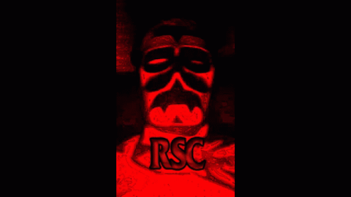 Man In Mask Sitting In Red Light GIF
