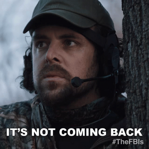 A Man With A Microphone On His Head And The Words It 'S Not Coming Back Below Him GIF