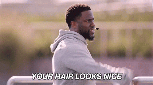 A Man With A Microphone On His Head Says " Your Hair Looks Nice " GIF