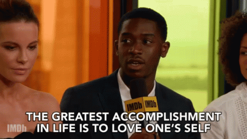 A Man With A Microphone That Says Imdb On It GIF