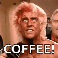 A Man With A Mohawk Is Holding A Microphone And Says `` Coffee ! '' GIF