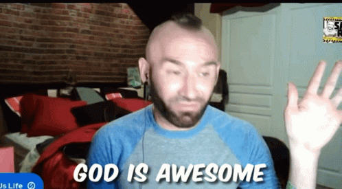 A Man With A Mohawk Says God Is Awesome In A Bedroom GIF