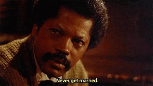 A Man With A Mustache And A Crying Eye Is Saying `` Never Get Married '' . GIF