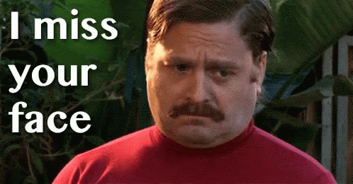 A Man With A Mustache And A Red Shirt Says I Miss Your Face . GIF