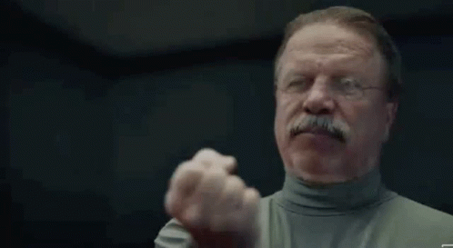 A Man With A Mustache And Glasses Is Giving A Thumbs Up . GIF