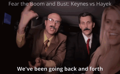 A Man With A Mustache And Glasses Says " We 'Ve Been Going Back And Forth " In Front Of A Woman GIF
