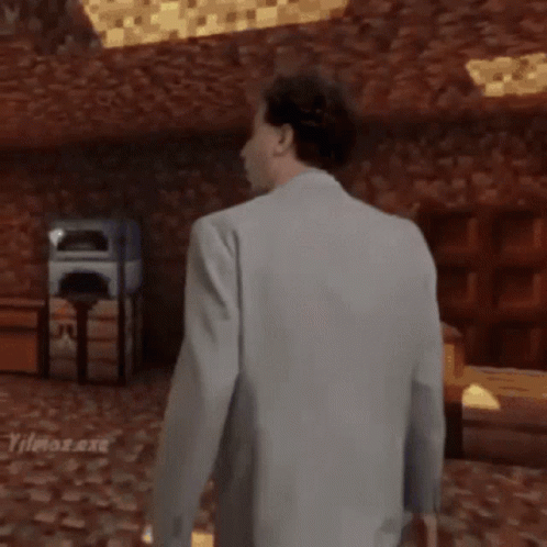 A Man With A Mustache And Tie Says King In The GIF