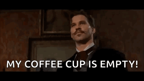 A Man With A Mustache Is Holding A Cup Of Coffee And Says `` My Coffee Cup Is Empty '' . GIF