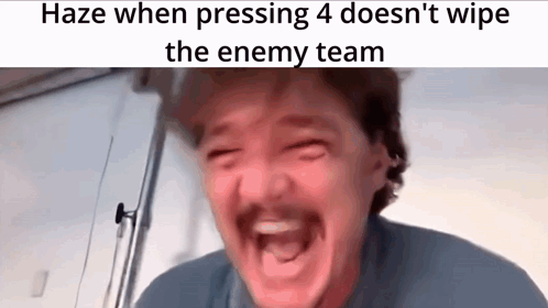 A Man With A Mustache Is Making A Funny Face While Pressing 4 On A Video Game . GIF