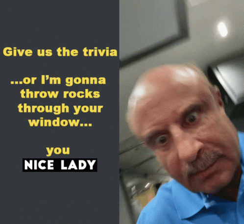 A Man With A Mustache Is Next To A Sign That Says " Give Us The Trivia " GIF