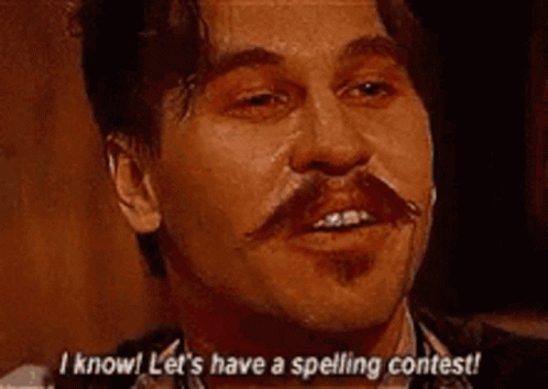 A Man With A Mustache Is Saying `` Let 'S Have A Spelling Contest '' . GIF