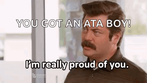 A Man With A Mustache Is Saying `` You Got An Ata Boy ! '' GIF