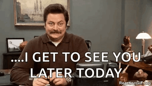A Man With A Mustache Is Sitting At A Desk And Says `` I Get To See You Later Today . '' GIF
