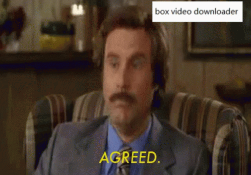 A Man With A Mustache Is Sitting In A Chair With His Eyes Closed And Says Agreed GIF