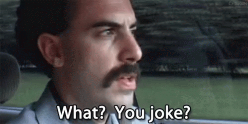 A Man With A Mustache Is Sitting In The Back Seat Of A Car . GIF