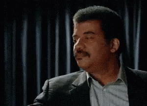 A Man With A Mustache Is Smiling With The Word Science Written On His Face . GIF