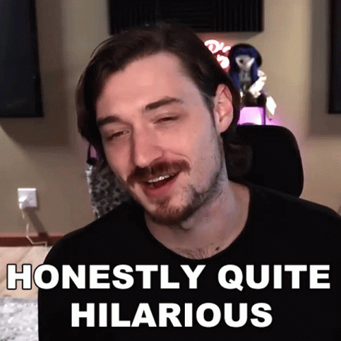 A Man With A Mustache Is Smiling With The Words Honestly Quite Hilarious Below Him GIF