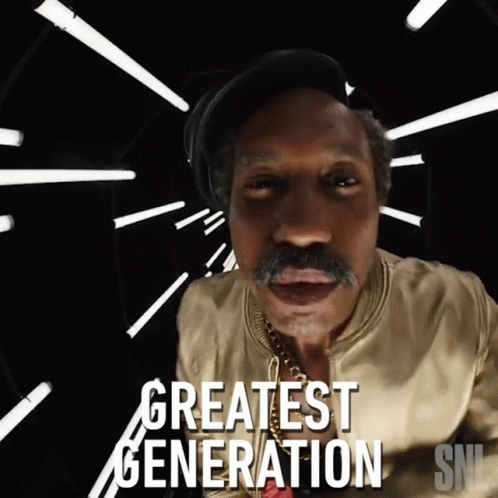 A Man With A Mustache Is Standing In Front Of A Sign That Says " Greatest Generation " GIF