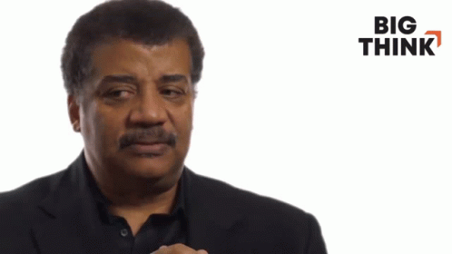 Man With Mustache Standing In Front Of Big Think Sign GIF