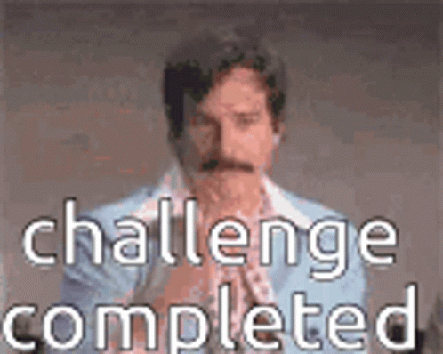 A Man With A Mustache Is Wearing A Blue Suit And A White Shirt . GIF