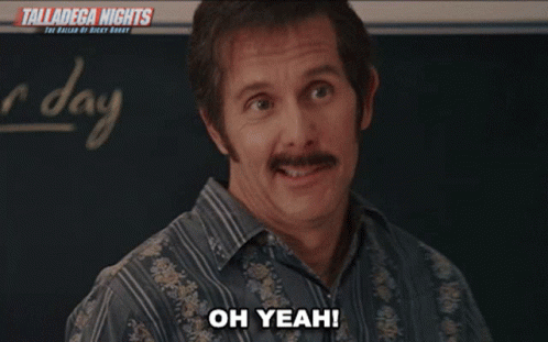 A Man With A Mustache Says " You Know What I 'M Talking About " In Front Of A Blackboard GIF