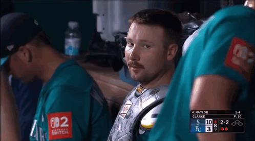A Man With A Mustache Wearing A Shirt That Says 602 GIF