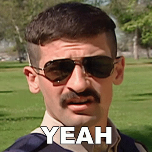A Man With A Mustache Wearing Sunglasses And The Word Yeah On His Face GIF