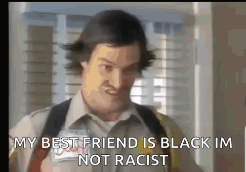 A Man With A Name Tag That Says ' My Best Friend Is Black Im Not Racist ' GIF