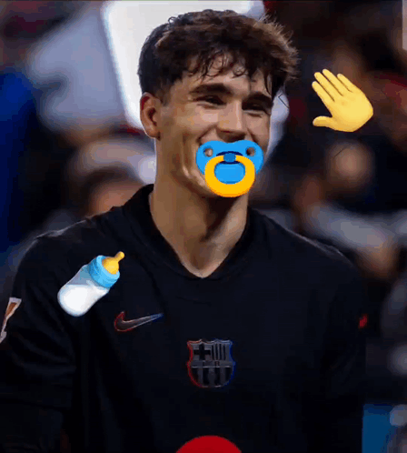 A Man With A Pacifier In His Mouth Is Wearing A Nike Jersey GIF