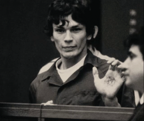 A Man With A Pentagram Tattoo On His Palm GIF