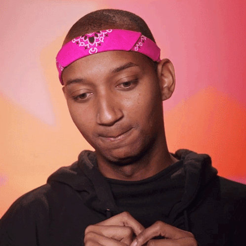 Man With Pink Bandana Looking Down GIF