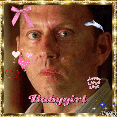 A Man With A Pink Bow On His Head And The Words Babygirl GIF