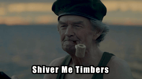 A Man With A Pipe In His Mouth And The Words Shiver Me Timbers Above Him GIF