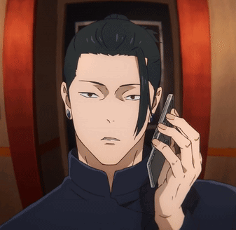 A Man With A Ponytail Is Talking On A Cellphone GIF