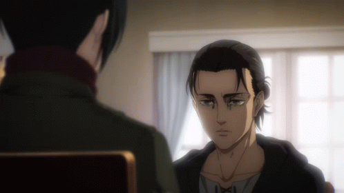 A Man With A Ponytail Looks At Another Man GIF