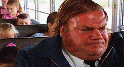 A Man With A Red Face Is On A School Bus GIF
