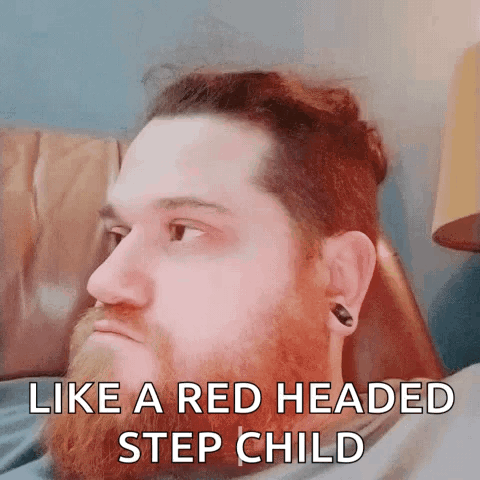 A Man With A Red Headed Step Child Caption On His Face GIF