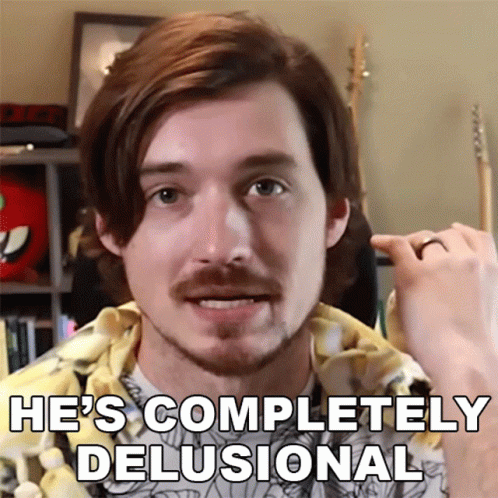 A Man With A Ring On His Finger And The Words He 'S Completely Delusional GIF