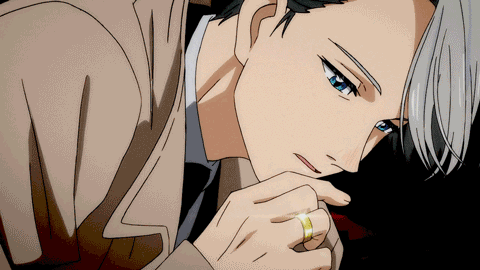 A Man With A Ring On His Finger Looks Down GIF