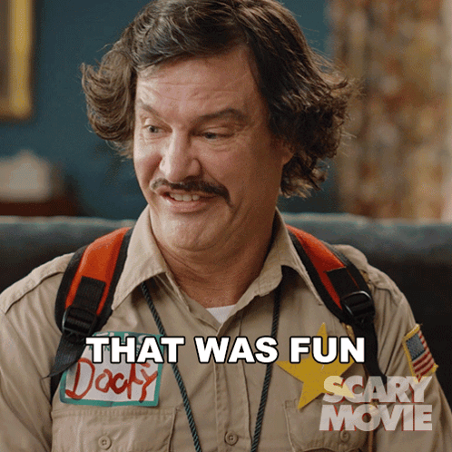 A Man With A Scary Movie Sticker On His Shirt Says That Was Fun GIF