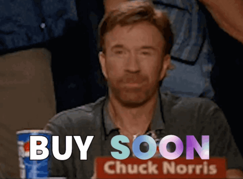 A Man With A Sign That Says Buy Soon Chuck Norris GIF