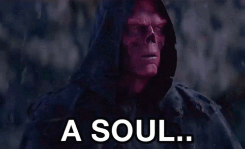A Man With A Skull On His Face And The Words `` For A Soul '' Written Below Him . GIF