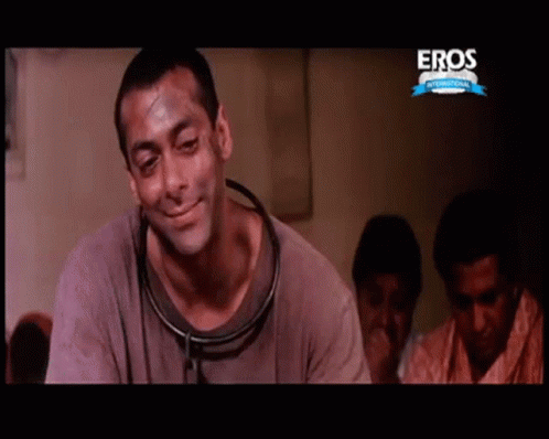 A Man With A Stethoscope Around His Neck Is On A Screen That Says Eros GIF