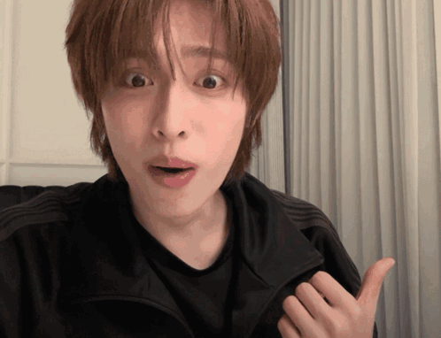 A Man With A Surprised Look On His Face GIF