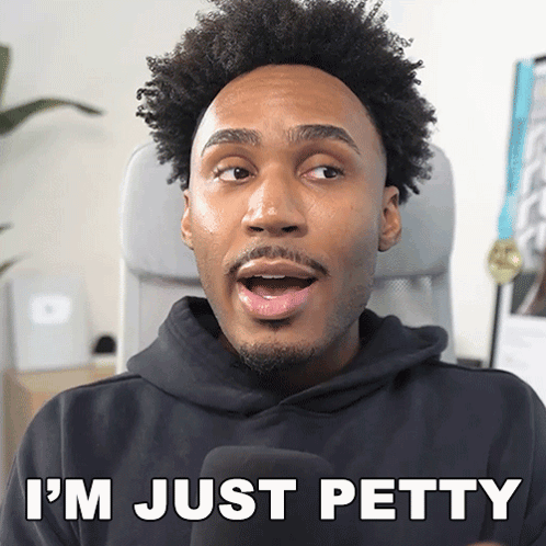 A Man With A Surprised Look On His Face And The Words I 'M Just Petty Behind Him GIF