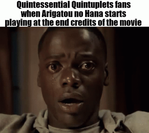 A Man With A Surprised Look On His Face Is Playing At The End Credits Of The Movie Quintessential Quintuplets . GIF