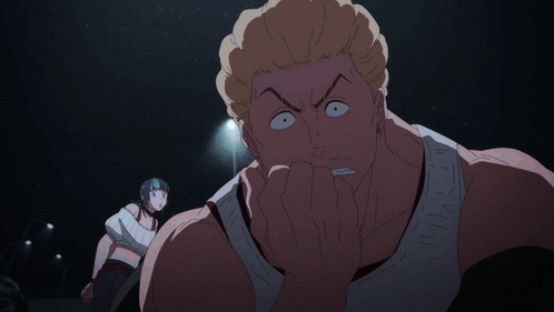 A Man With A Surprised Look On His Face Stands Next To A Girl GIF