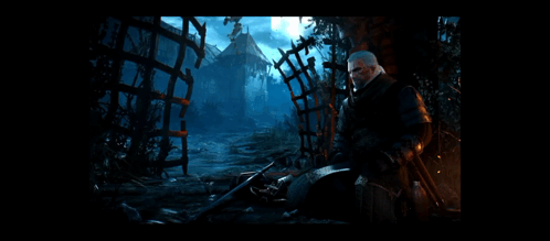 A Man With A Sword Is Sitting In The Dark GIF