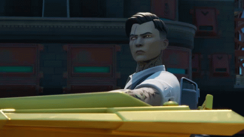 A Man With A Tattoo On His Arm Is Sitting In A Yellow Car GIF