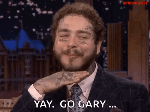 A Man With A Tattoo On His Face Says Yay Go Gary GIF